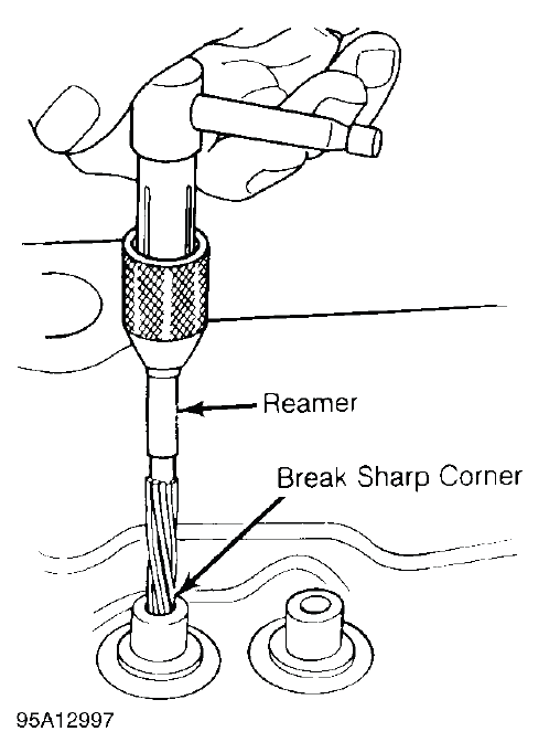 Fig. 7: Reaming Valve Guides